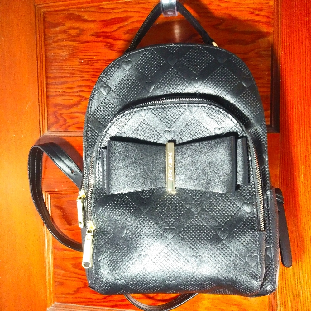 Black Betsey Johnson backpack with bow